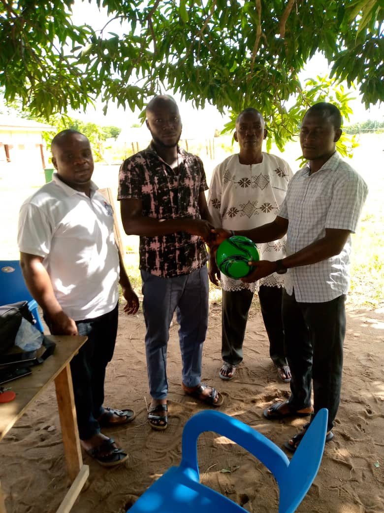 Abenyinase Assemblyman donates football to schools